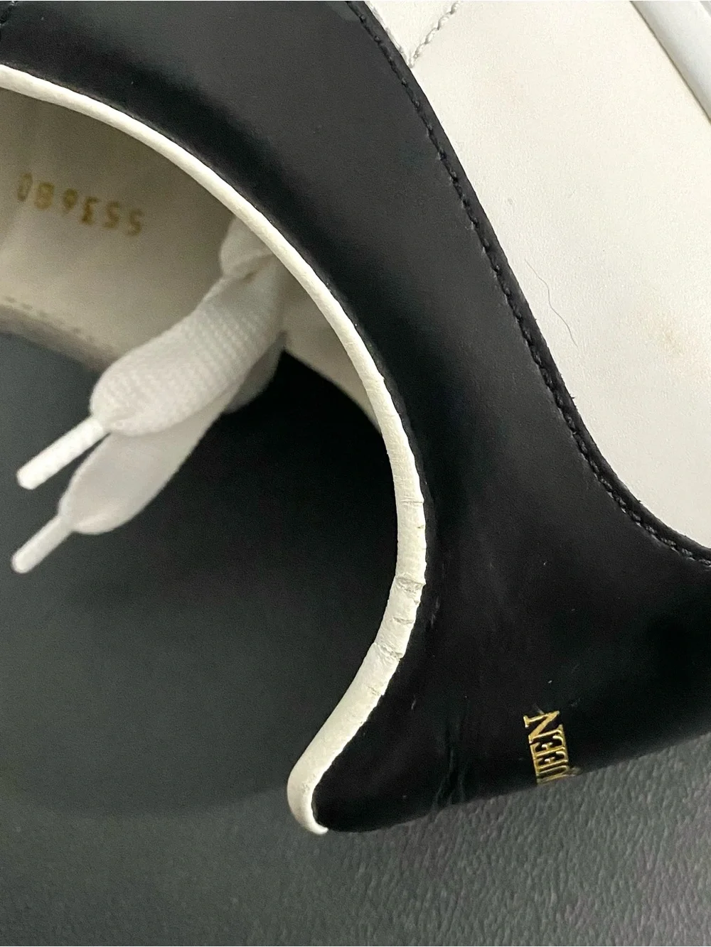 Alexander McQueen White Leather Sneakers with Black Heel Tab